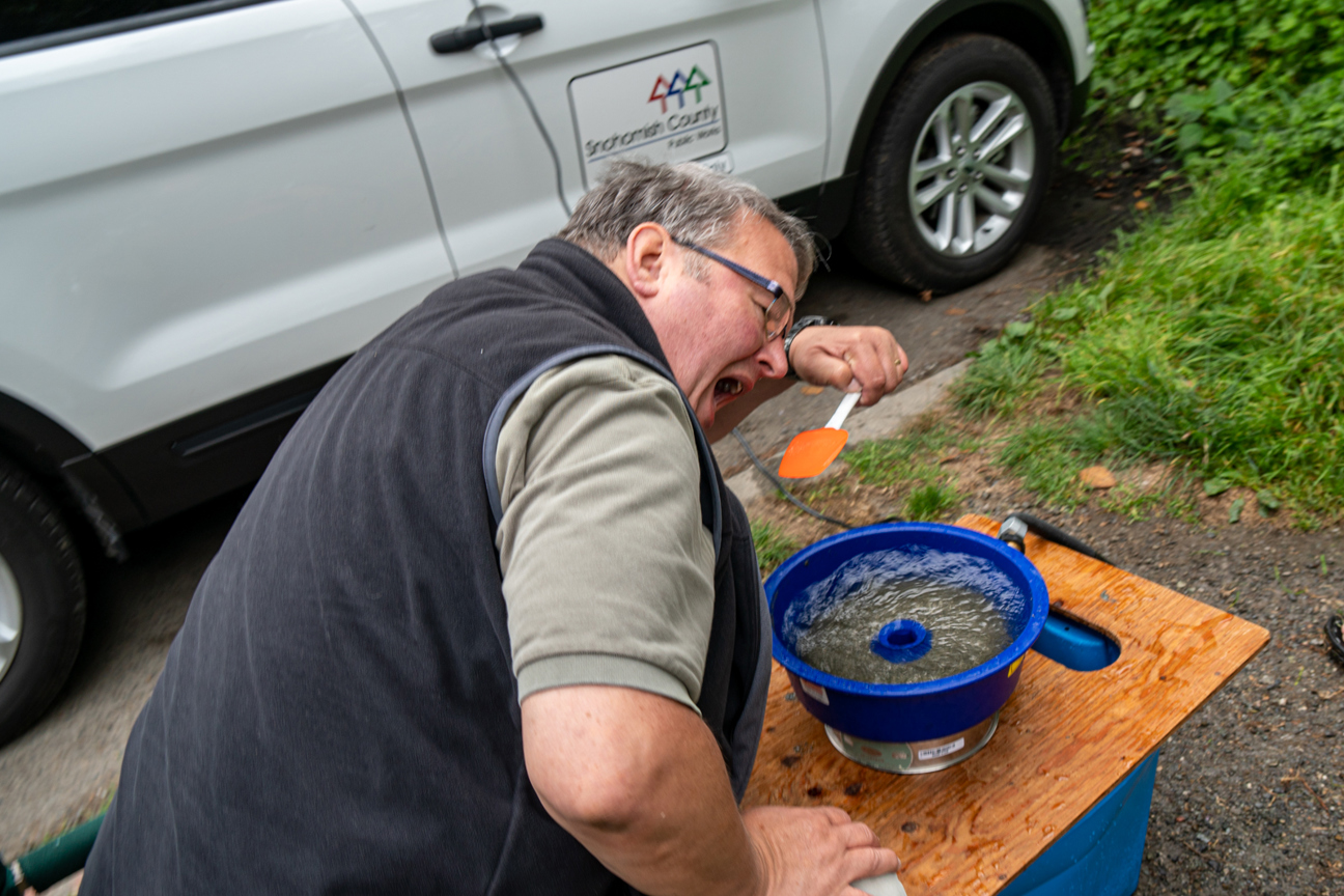 MRC member being silly with forage fish blue vortex by pretending to eat it